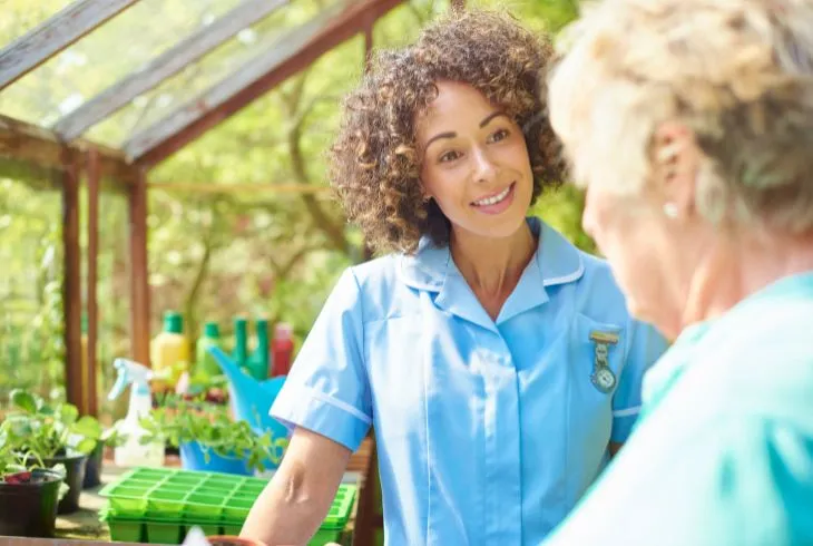 elderly lady with carer